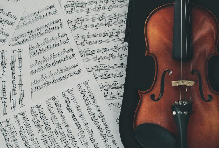 sheet music and a violin
